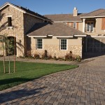 A newly constructed, modern american home with fresh landscaping